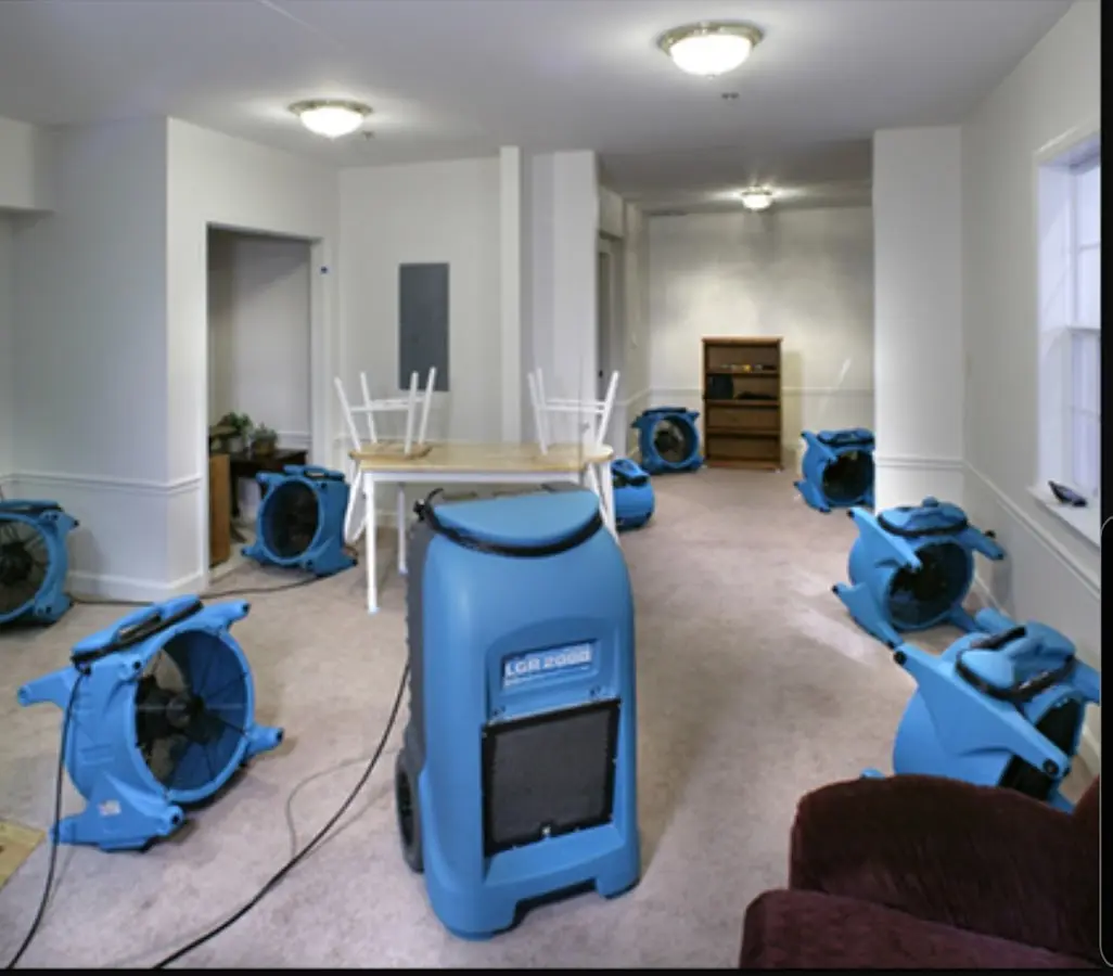 Air movers and dehumidifier setup for Water Extraction & Removal in Brock Hall